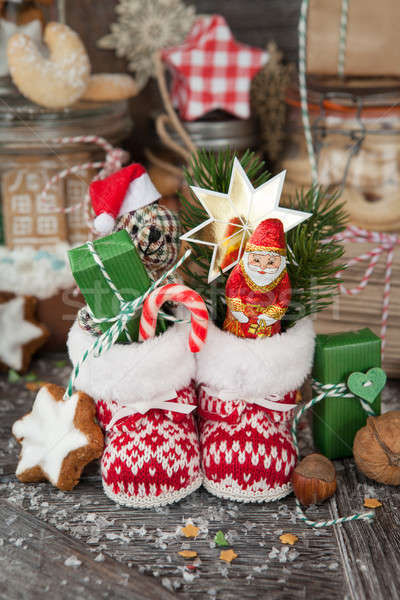 Kicsi karácsony csizma ajándékok csemegék csokoládé Stock fotó © BarbaraNeveu