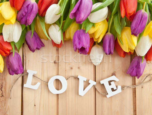 Stock photo: Fresh tulips on wooden background