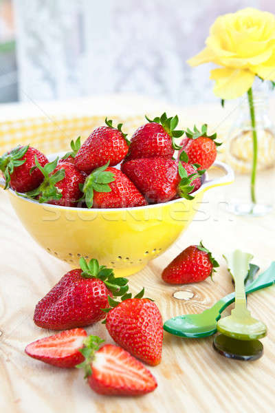 Fresh strawberries in yellow sieve Stock photo © BarbaraNeveu