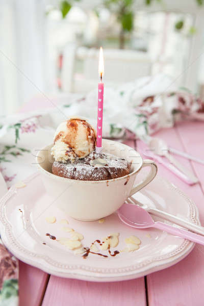 Stock photo: Mug cake with vanilla ice cream