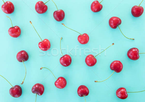Sweet cherries on blue Stock photo © BarbaraNeveu