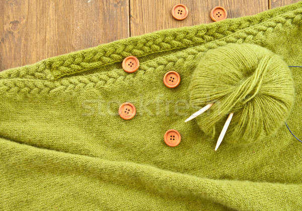 Stock photo: Handmade knitted scarf with green wool