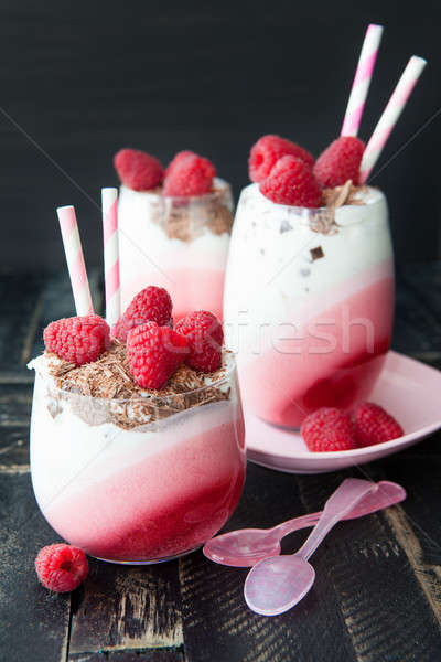 Stock photo: Layered cream dessert with raspberries