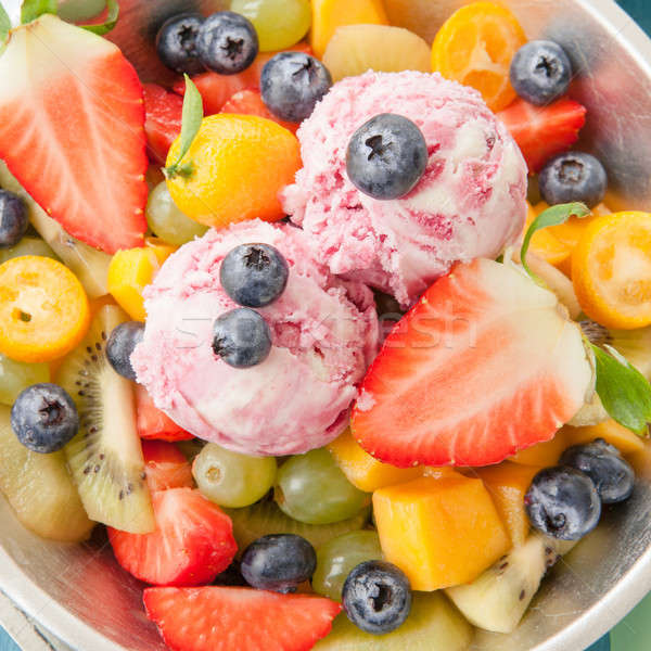 Fresh fruit salad with scoops of ice cream Stock photo © BarbaraNeveu
