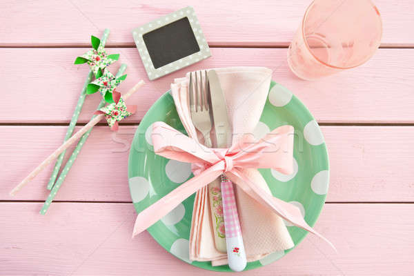 Colorful plate on rustic pink background Stock photo © BarbaraNeveu