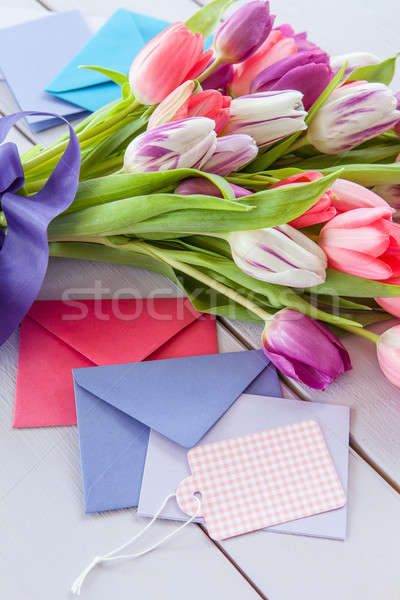 Colorful tulips on purple Stock photo © BarbaraNeveu