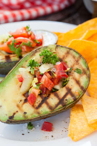 Grilled avocado with tortilla chips Stock photo © BarbaraNeveu