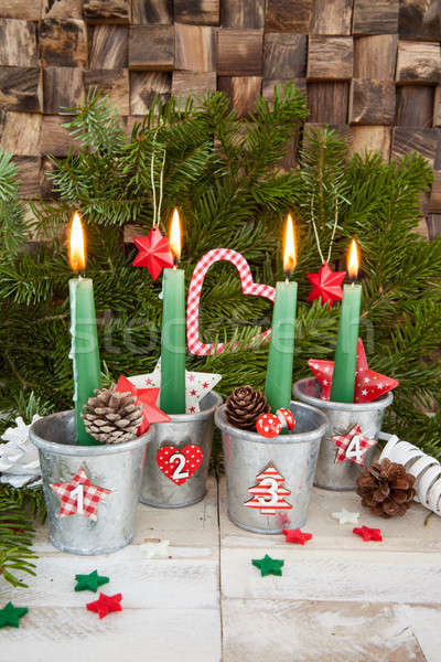 Quatro advento velas ardente natal decorações Foto stock © BarbaraNeveu