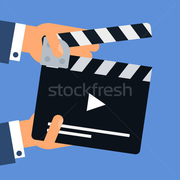 Flat movie clapperboard Stock photo © barsrsind