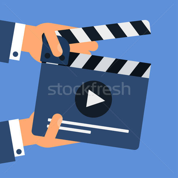 Flat movie clapperboard Stock photo © barsrsind