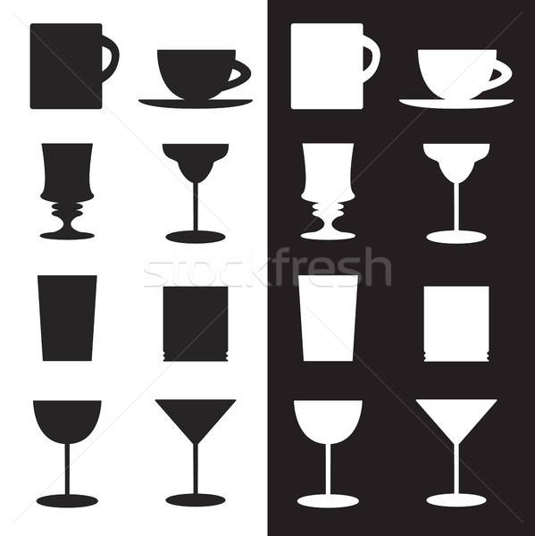 set of goblets, cups, glass silhouettes Stock photo © barsrsind