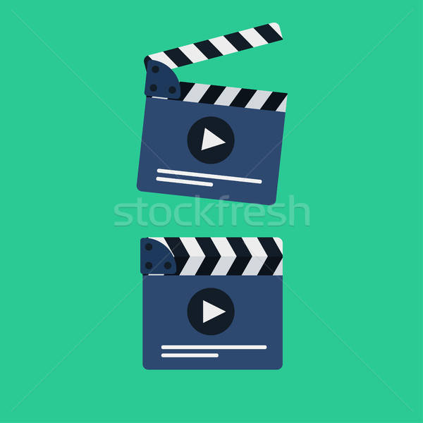 Flat movie clapperboard Stock photo © barsrsind