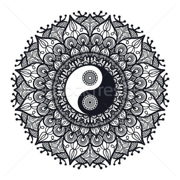 Vintage Yin and Yang in Mandala Stock photo © barsrsind