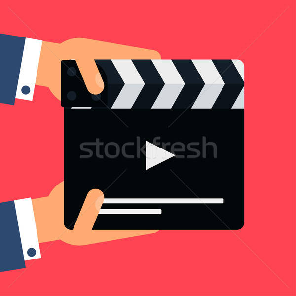 Flat movie clapperboard Stock photo © barsrsind