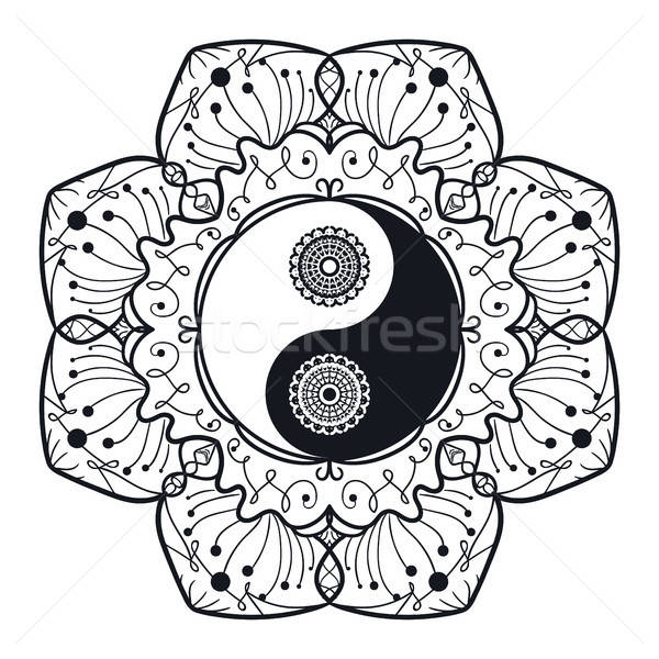 Vintage Yin and Yang in Mandala Stock photo © barsrsind