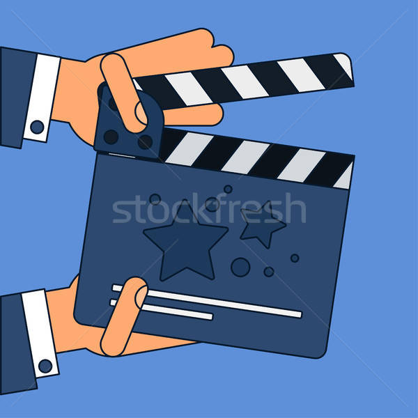 Flat movie clapperboard Stock photo © barsrsind