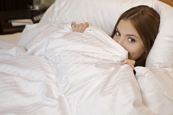 женщину кровать спальный брюнетка красоту подростков Сток-фото © bartekwardziak