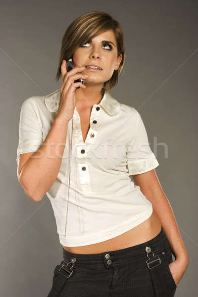 Stock photo: blondie with mobile phone