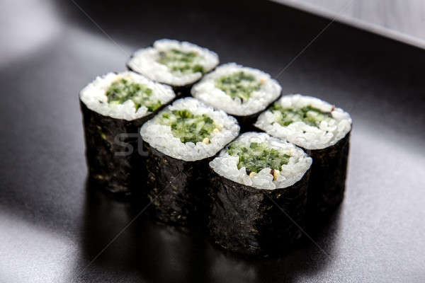 Sushi maki rollen zwarte schotel Stockfoto © bartekwardziak