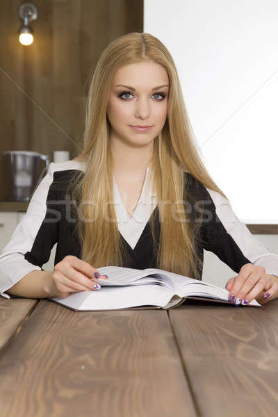 Stock photo: Portrait of clever student reading book