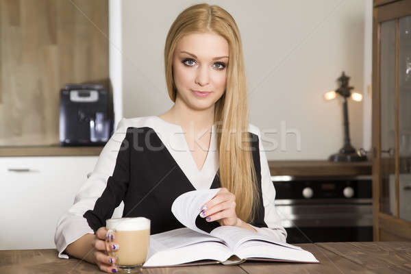 Stock photo: Portrait of clever student reading book