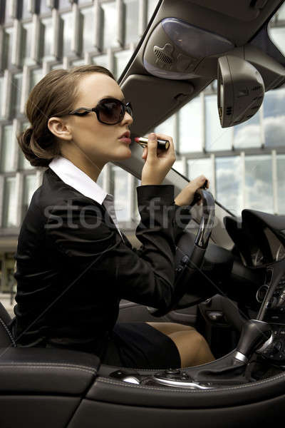 businesswoman in a cabrio Stock photo © bartekwardziak