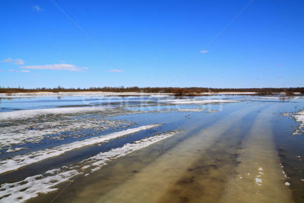 Stock photo: winter road under spring water