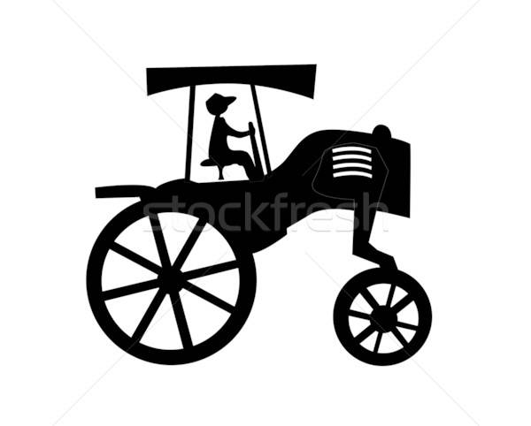 vector silhouette of the old tractor on white background Stock photo © basel101658