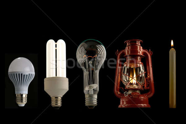 Evoluzione illuminazione luce fuoco vetro lampada Foto d'archivio © bazilfoto