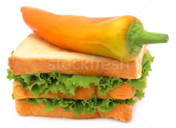 Bread slices with banana pepper and green lettuce inside Stock photo © bdspn