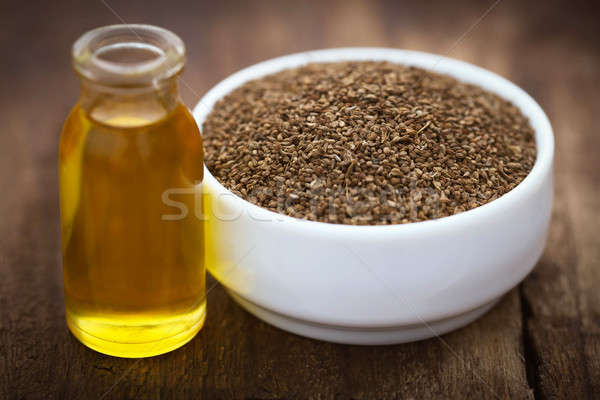 Stock photo: Ajwain seeds in a bowl with essential oil