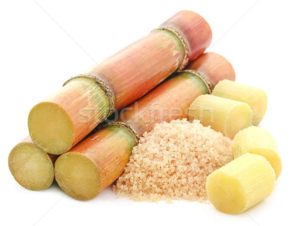 Piece of sugarcane with red sugar Stock photo © bdspn