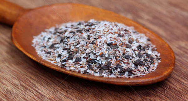 Medicinal herbs isabgul and basil seeds on a wooden spoon  Stock photo © bdspn