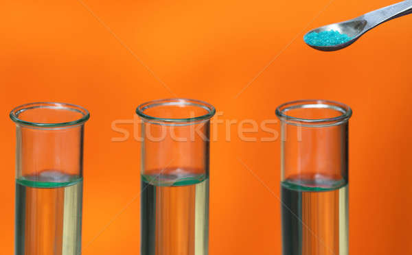 Test tubes with spatula containing chemical Stock photo © bdspn