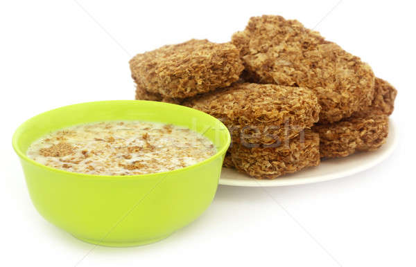 Oat cookies in milk Stock photo © bdspn