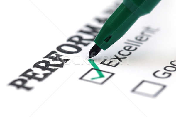 Değerlendirme kâğıt kalem yeşil arka plan imzalamak Stok fotoğraf © bdspn