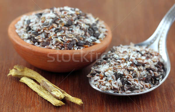 Medicinal herbs on a wooden surface Stock photo © bdspn