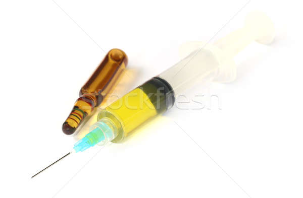 Hypodermic syringe with ampule Stock photo © bdspn