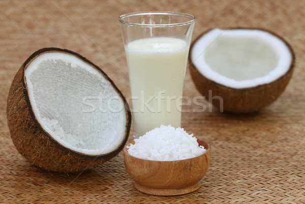Coconut with milk and grated form  Stock photo © bdspn