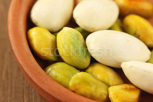 Green Pistachios with peeled almond Stock photo © bdspn