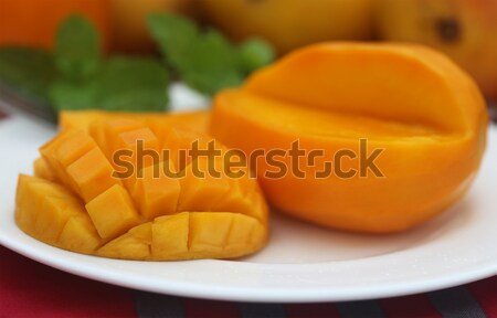 Ripe mangoes with mint leaves Stock photo © bdspn