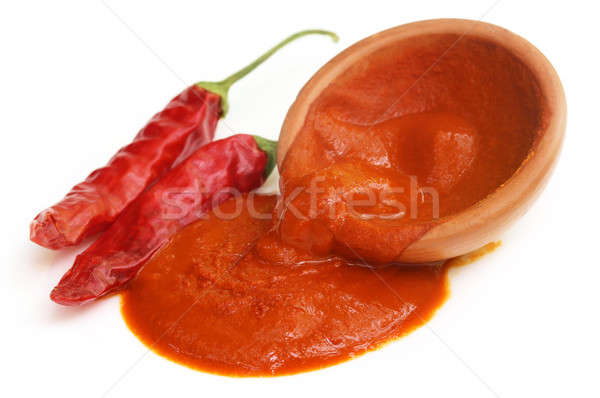 Red hot chilies with paste Stock photo © bdspn