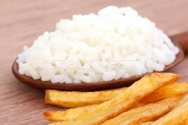 French fry with fresh rice over brown background Stock photo © bdspn