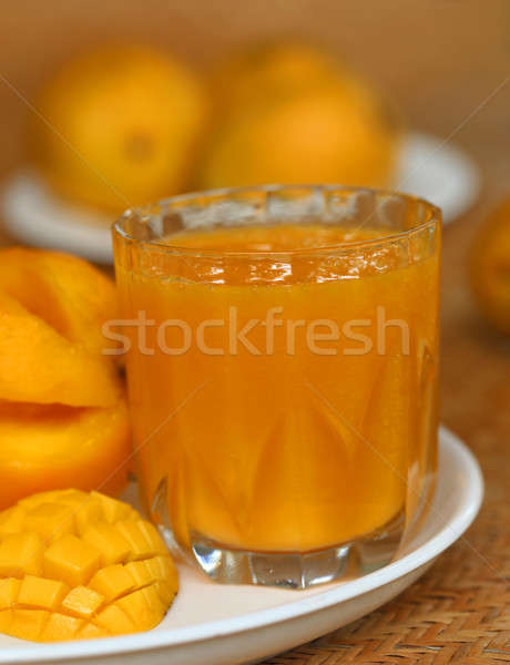 Ripe mangoes with juice Stock photo © bdspn