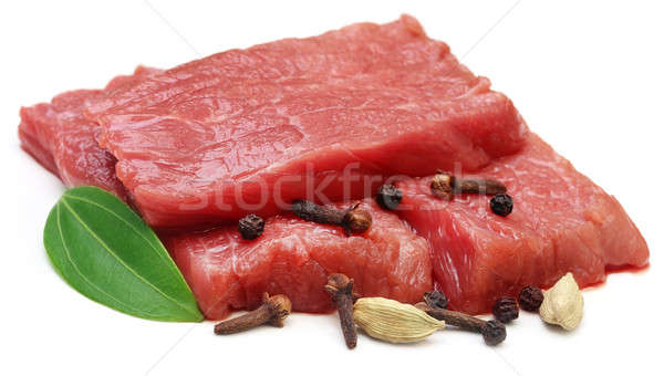 Surowy wołowiny przyprawy biały żywności tle Zdjęcia stock © bdspn