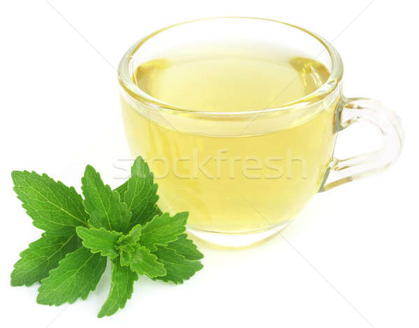 Herbal tea in a cup with stevia leaves Stock photo © bdspn