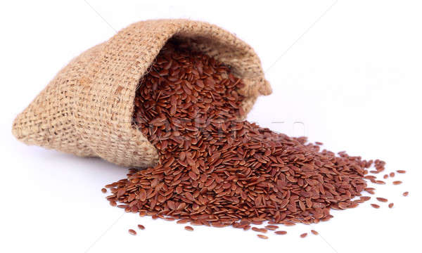 Flax seeds in jute bag Stock photo © bdspn