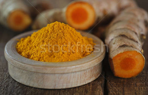 Raw and ground turmeric Stock photo © bdspn