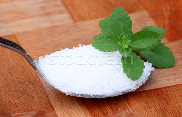 Stevia with spoonful of suger Stock photo © bdspn
