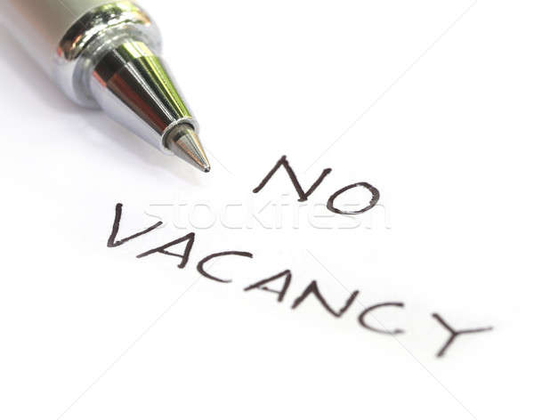 No vacancy written on a white paper Stock photo © bdspn